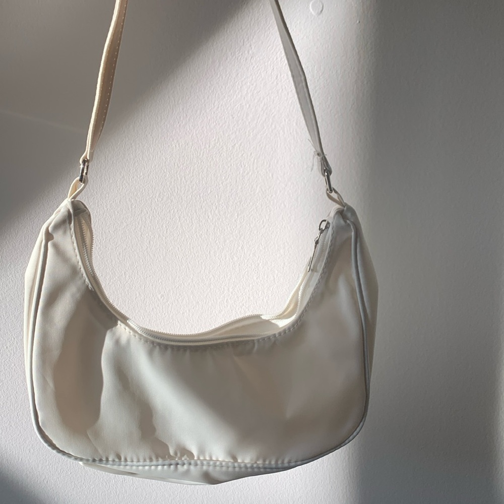 White purse— brand new in wrapping with barcode